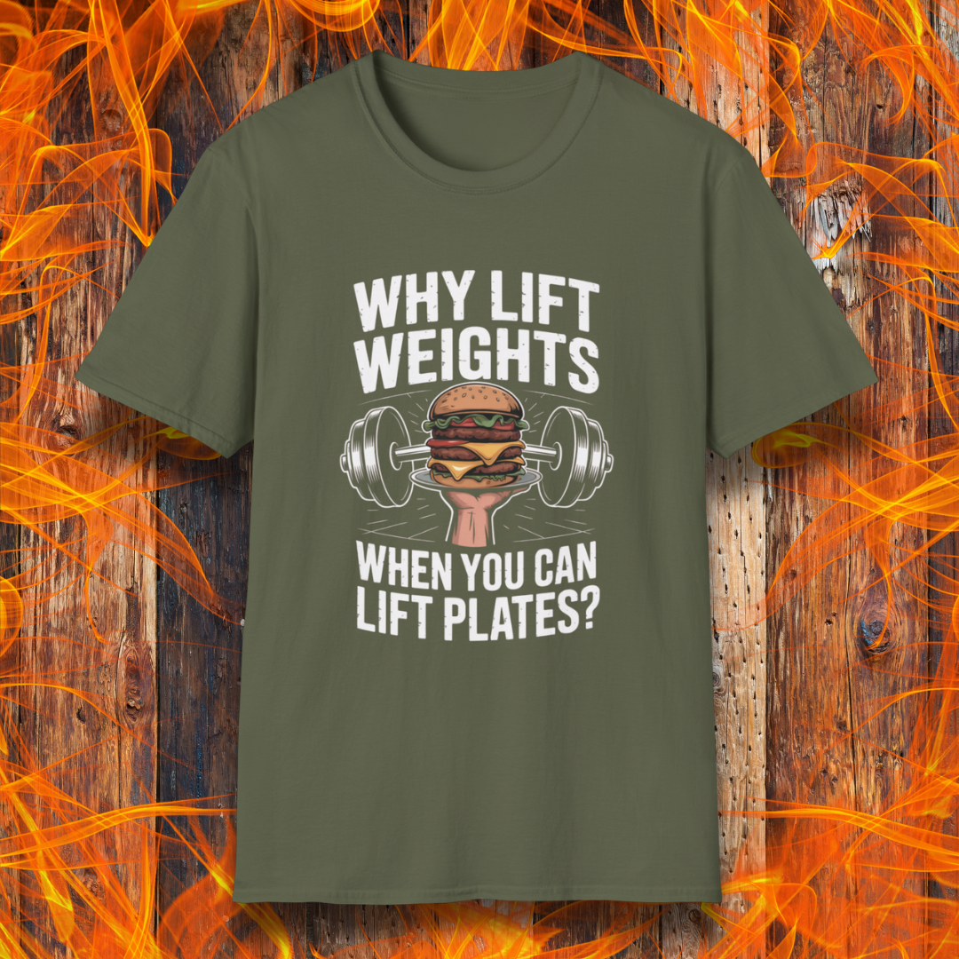 Green t-shirt with a graphic and text on a wooden background with flames