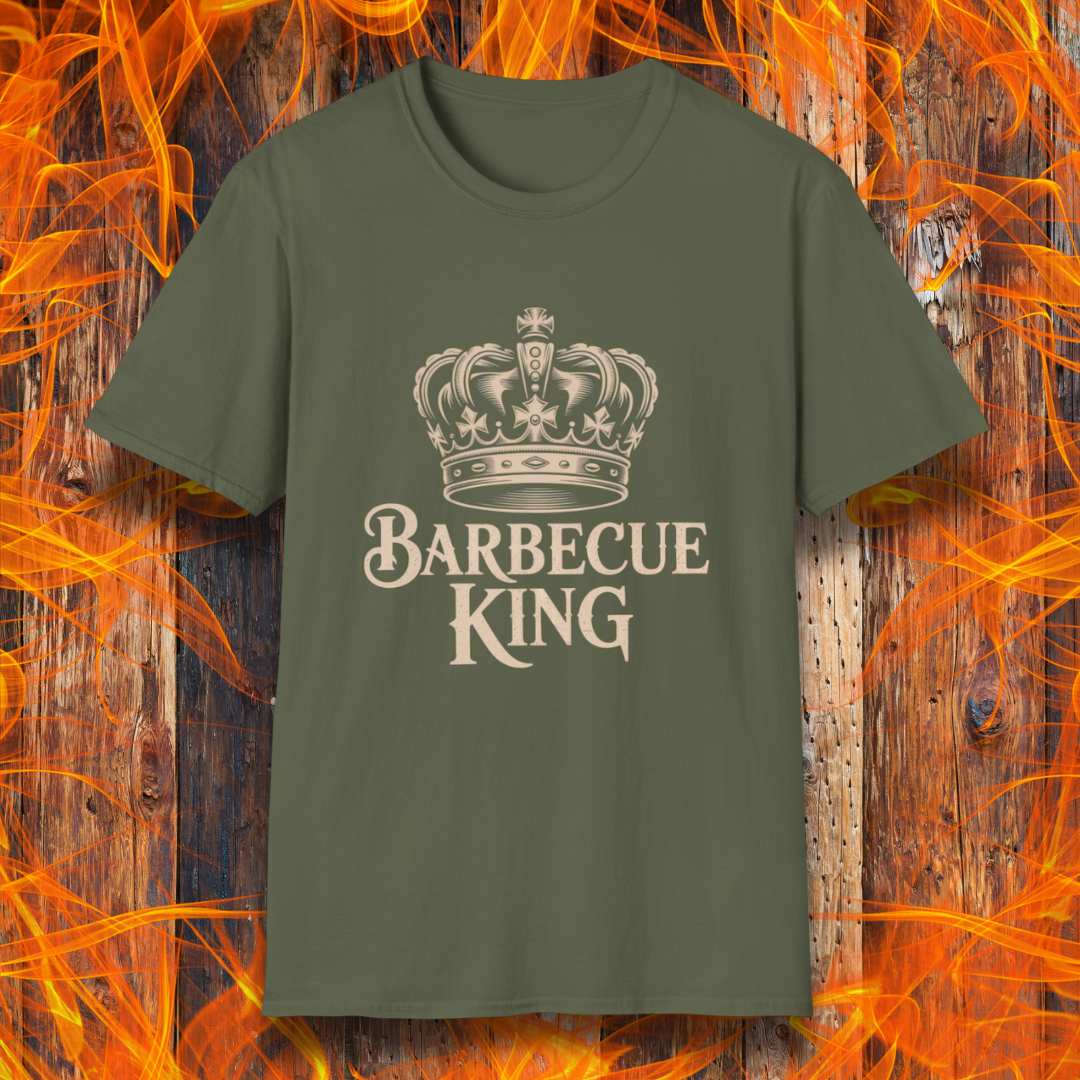 Green t-shirt with 'Barbecue King' design on a wooden background with flames.