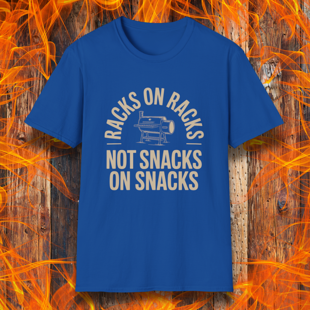 Blue t-shirt with white text and graphic on a wooden background with flames