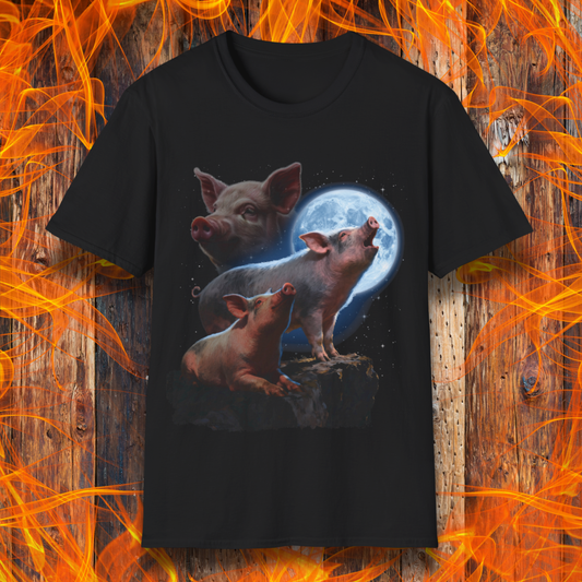 Black t-shirt with pigs and a moon design on a wooden background with flames.