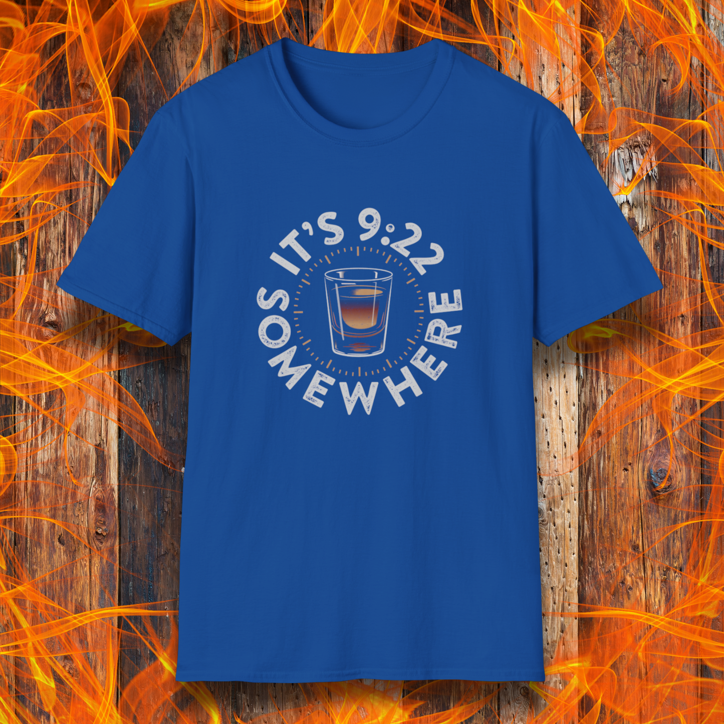 Blue t-shirt with a graphic design on a wooden background with flames