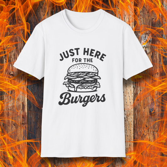 White t-shirt with a burger graphic and text on a wooden background with flames