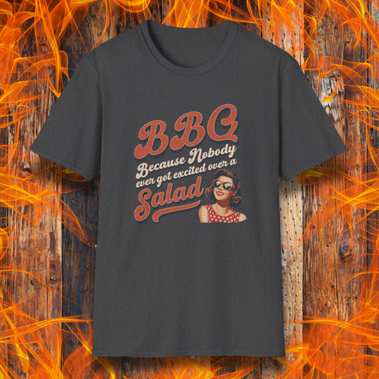 Black t-shirt with 'BBQ because nobody ever got excited over a salad' text and graphic on a fiery background