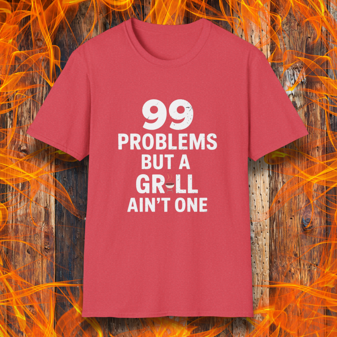 Heather Red T-shirt with bold white text that says "99 Problems But a Grill Ain’t One," featuring a small red grill icon replacing the "I" in "Grill" — a playful shirt for BBQ fans and grilling pros.