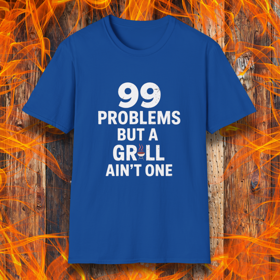 Royal T-shirt with bold white text that says "99 Problems But a Grill Ain’t One," featuring a small red grill icon replacing the "I" in "Grill" — a playful shirt for BBQ fans and grilling pros.