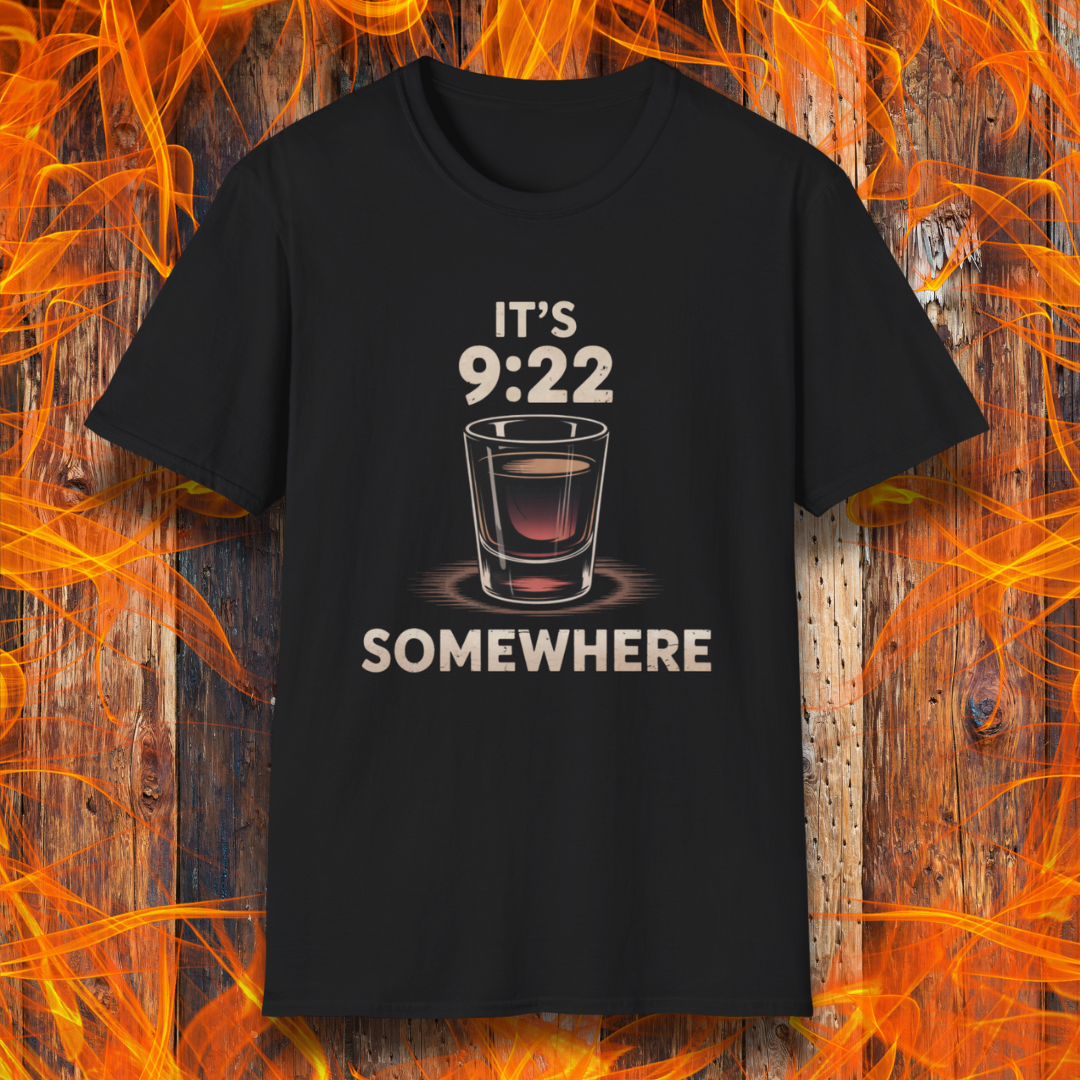 Black T-shirt featuring the phrase "It’s 9:22 Somewhere" with a detailed shot glass illustration, set against a rustic wood and flame background — a nod to the BBQ competition tradition of the 9:22 shot.