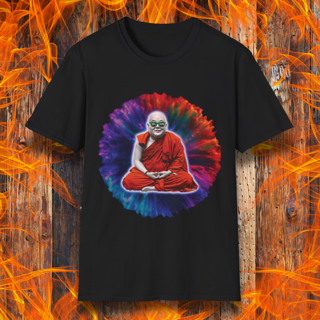 Black T-shirt featuring a meditating monk with a colorful tie-dye aura and "BBQ Guru" sunglasses. Perfect for BBQ masters, pitmasters, and grilling enthusiasts who take their craft to a spiritual level.