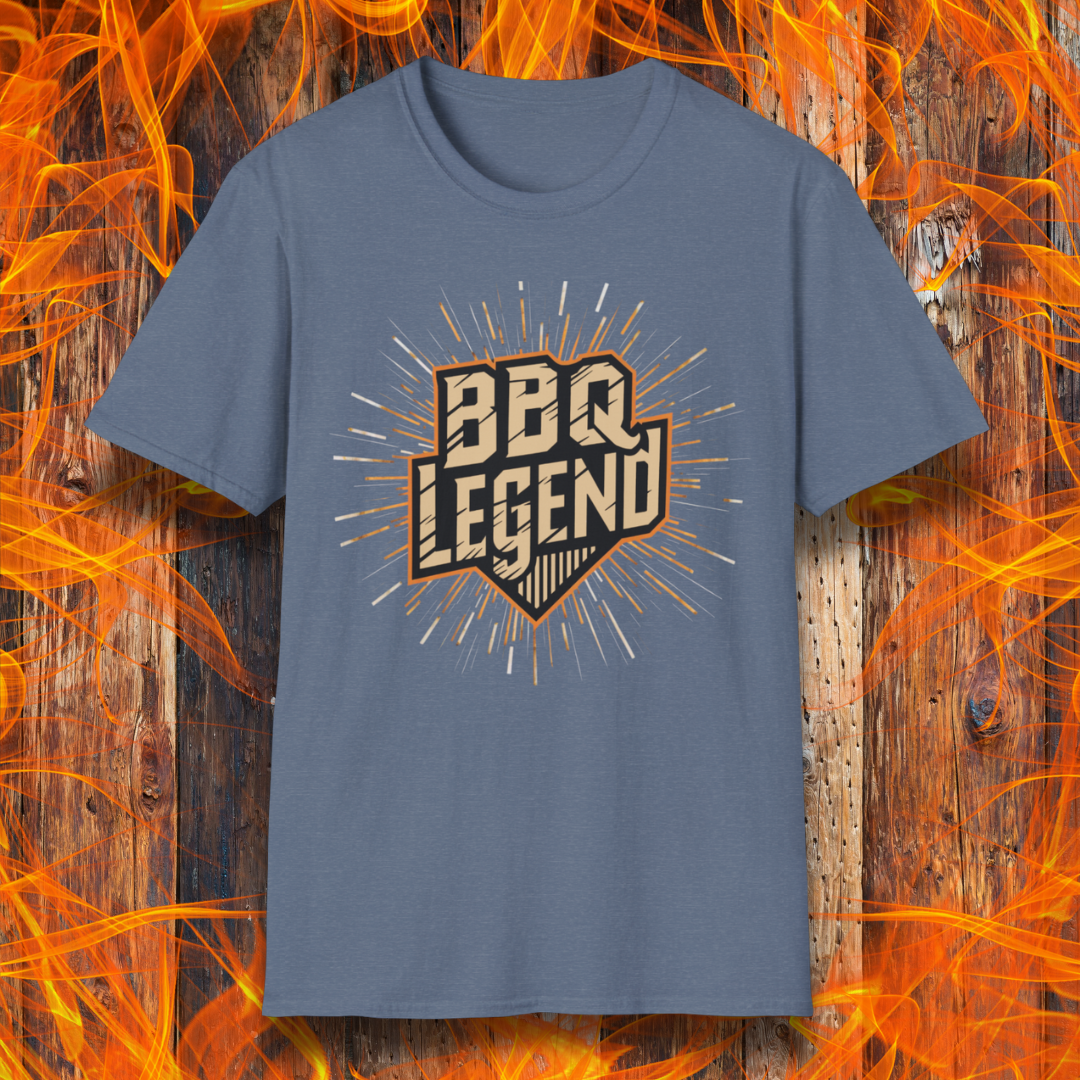 Heather Indigo t-shirt featuring a bold 'BBQ Legend' design with a vintage shield emblem and radiant burst effect, perfect for grill masters and barbecue enthusiasts.