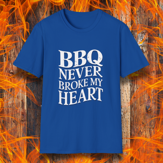 Royal Blue  t-shirt featuring bold white text that reads 'BBQ Never Broke My Heart' in a rustic, slightly distressed font, perfect for barbecue lovers who stay loyal to great smoked meats.