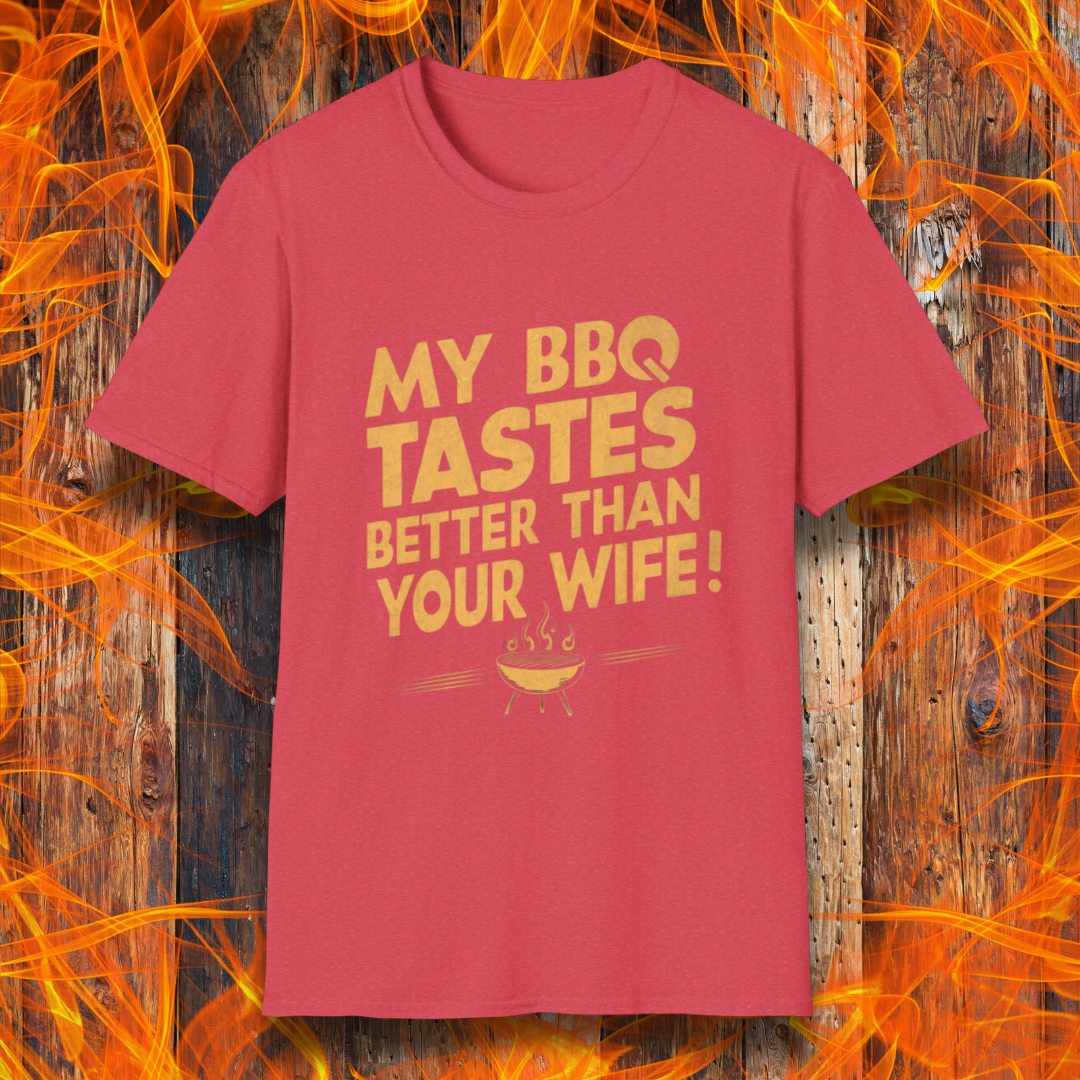 Heather Red T-shirt with a bold, cheeky design that reads 'MY BBQ TASTES BETTER THAN YOUR WIFE!' in vintage-style typography, featuring a small flaming grill icon. Perfect for grill masters with a sense of humor.
