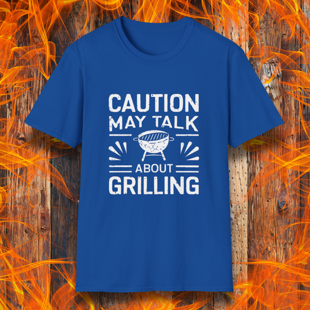 Royal Blue T-shirt featuring bold white text that reads 'CAUTION MAY TALK ABOUT GRILLING,' with a vintage-style BBQ grill illustration and decorative lines. Perfect for passionate grill masters who can't stop talking about barbecue.