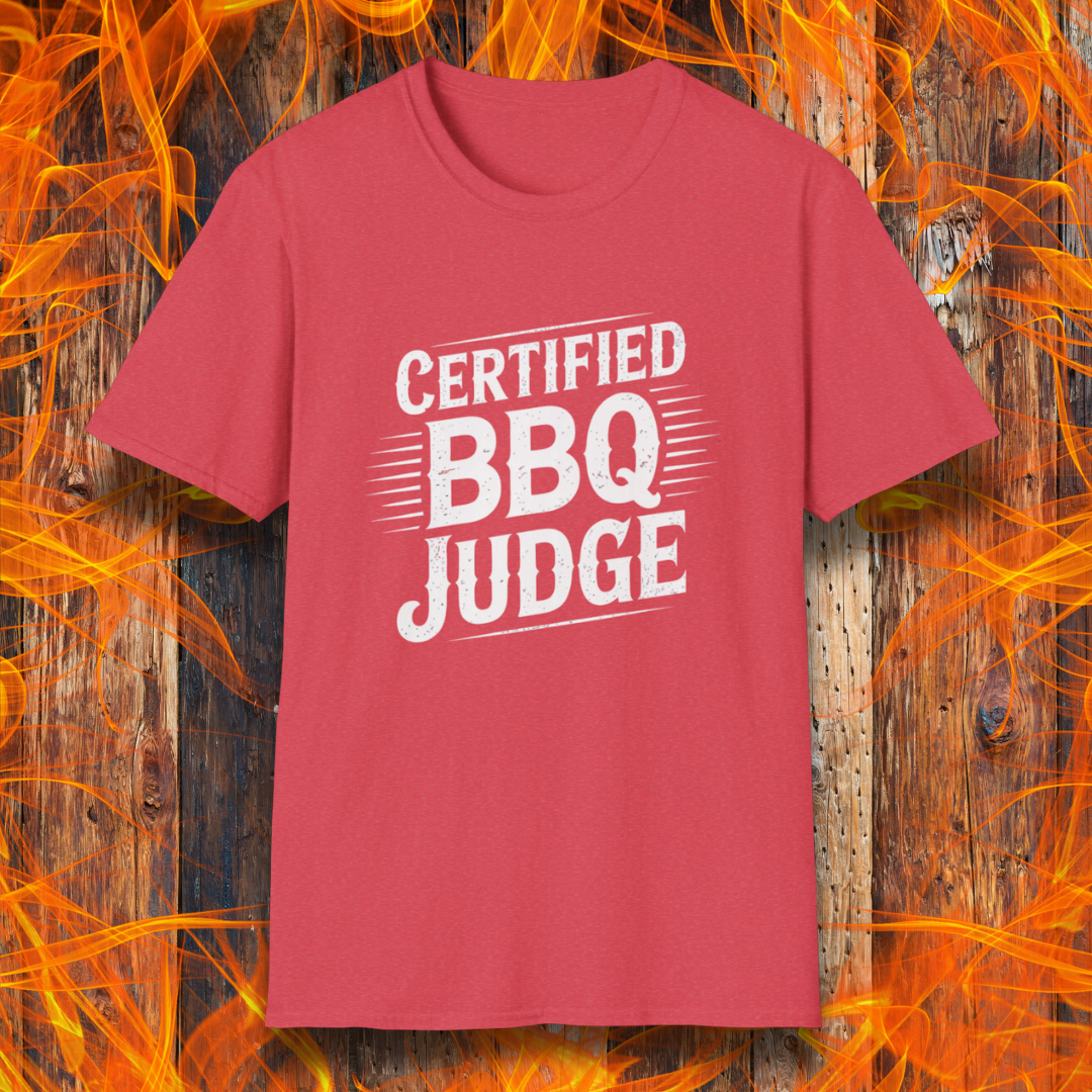 Bold "Certified BBQ Judge" graphic in distressed white text on a heather red t-shirt, perfect for BBQ-themed apparel or promotional use.