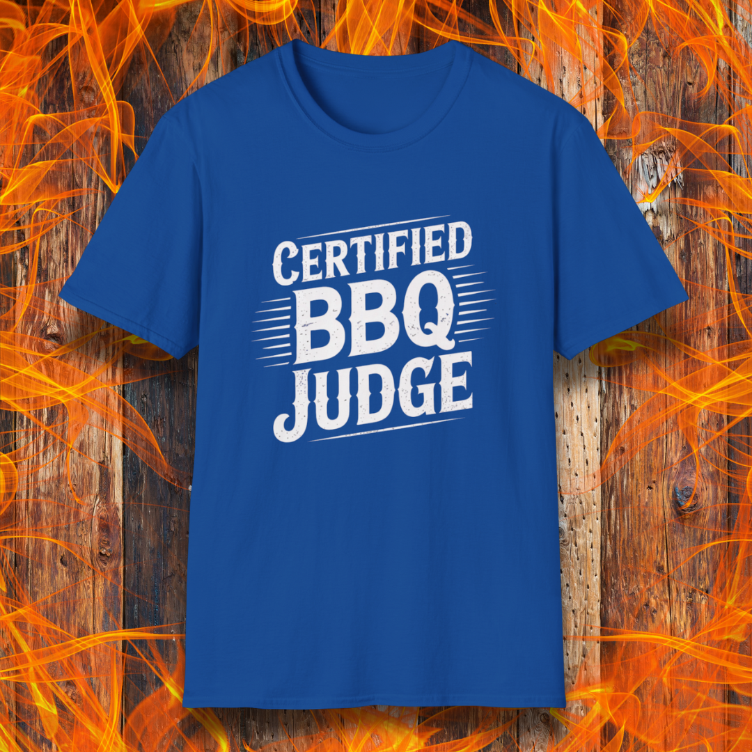 Bold "Certified BBQ Judge" graphic in distressed white text on a royal blue t-shirt, perfect for BBQ-themed apparel or promotional use.