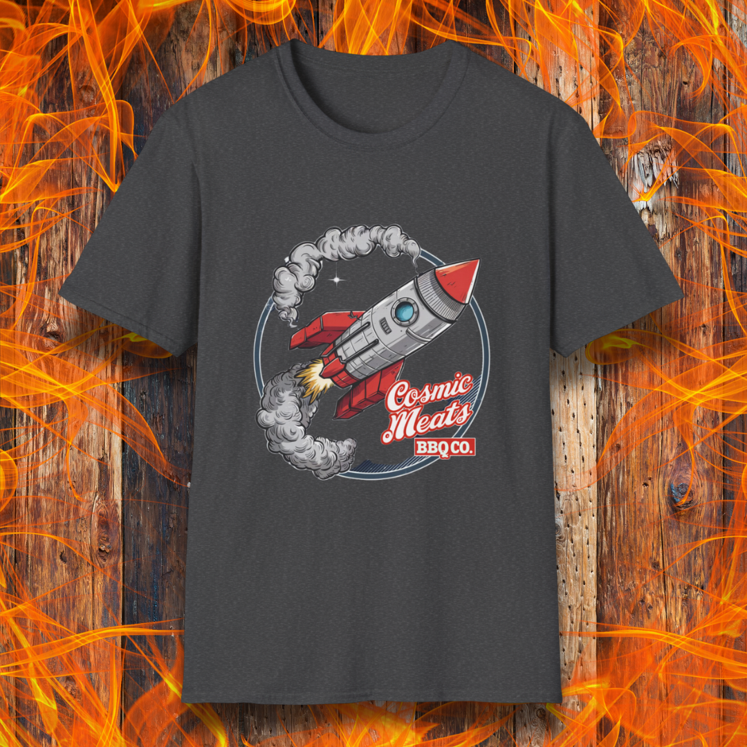 Dark Heather t-shirt featuring a retro-style rocket blasting off with smoke trails, paired with the text 'Cosmic Meats BBQ Co.'—a fun BBQ-themed space design.