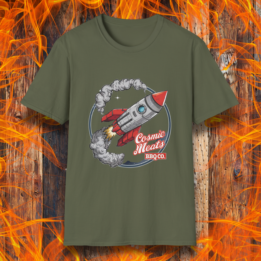 Military Green t-shirt featuring a retro-style rocket blasting off with smoke trails, paired with the text 'Cosmic Meats BBQ Co.'—a fun BBQ-themed space design.