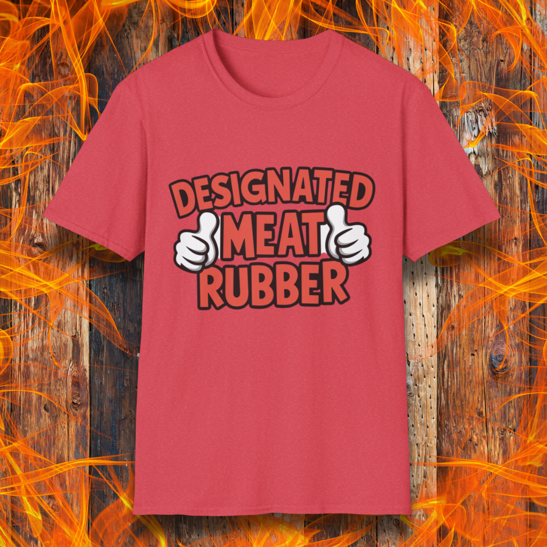 Heather Red T-shirt featuring bold text reading 'Designated Meat Rubber' with two thumbs-up graphics, a humorous BBQ-themed design for grill masters and barbecue lovers.