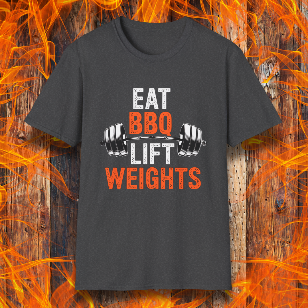 Dark Heather T-shirt featuring a bold fitness-inspired design with the phrase 'Eat BBQ Lift Weights' alongside a barbell graphic. Perfect for barbecue lovers who also enjoy hitting the gym and staying strong while indulging in their favorite grilled meats."