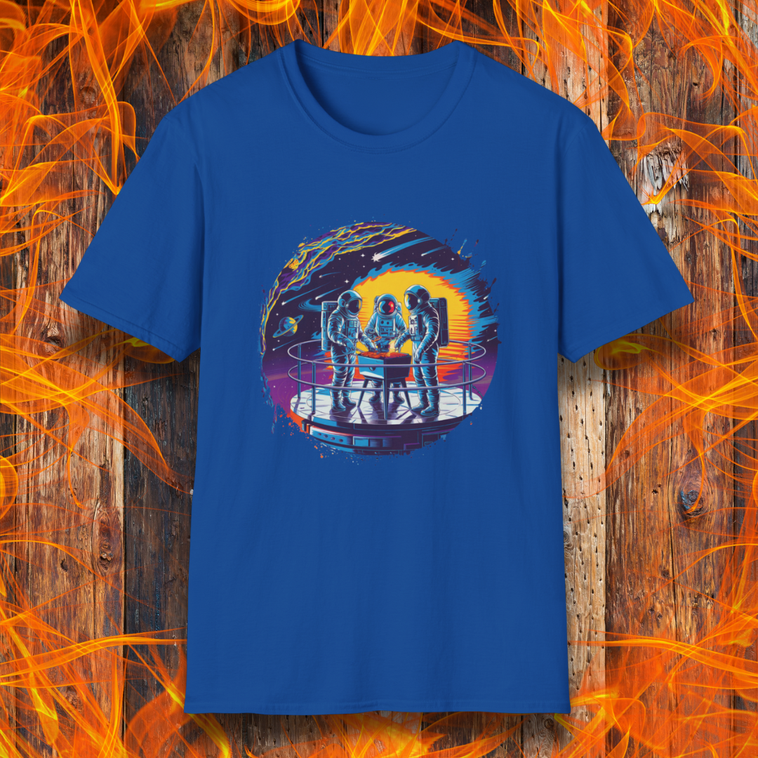 Royal Blue T-shirt showcases a vibrant, futuristic design featuring astronauts grilling in space. The scene is set on a metallic space station platform, with a cosmic backdrop of planets, stars, and a fiery explosion. The detailed artwork blends sci-fi with BBQ culture, making it a perfect choice for grilling enthusiasts who love a unique, out-of-this-world theme.
