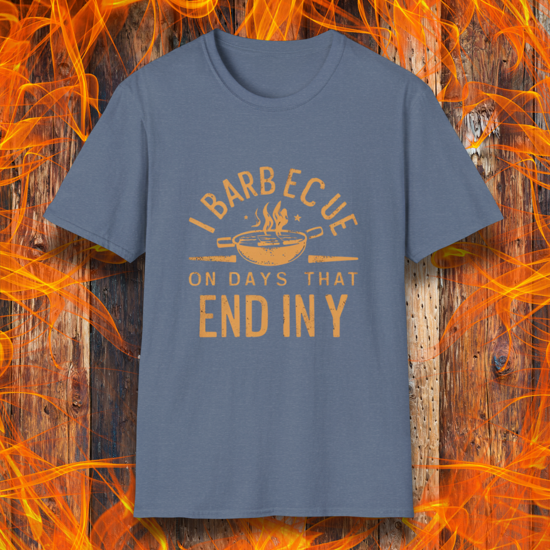 Heather IndigoT-shirt with 'I Barbecue on Days That End in Y' in bold, rustic orange lettering, featuring a steaming grill pan graphic. Perfect for grill masters who believe every day is BBQ day!