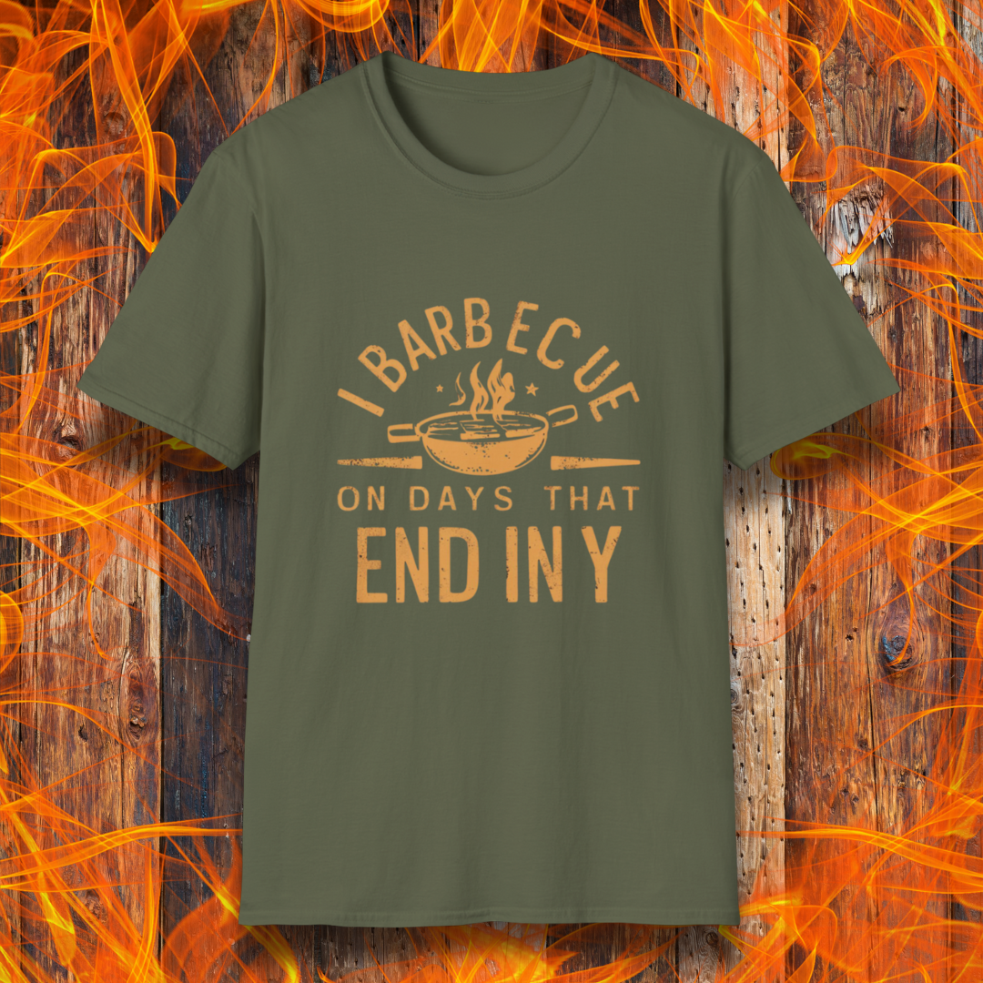 Military Green T-shirt with 'I Barbecue on Days That End in Y' in bold, rustic orange lettering, featuring a steaming grill pan graphic. Perfect for grill masters who believe every day is BBQ day!