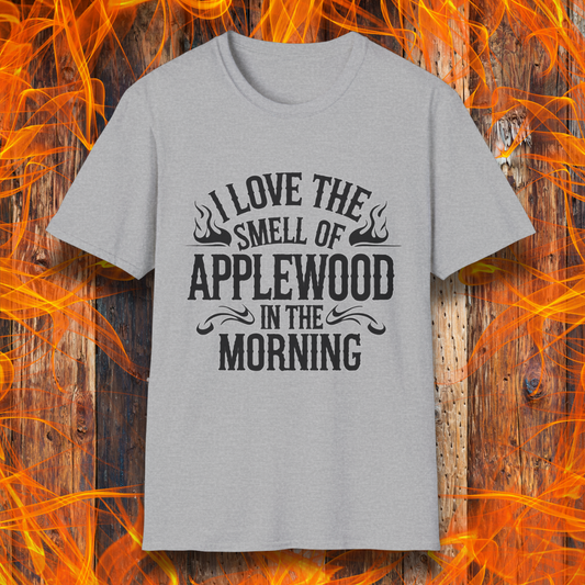 Sport Grey T-shirt featuring bold, rustic-style text that says, "I Love the Smell of Applewood in the Morning," with decorative flames. Perfect for BBQ lovers who appreciate the scent of wood-smoked meats.