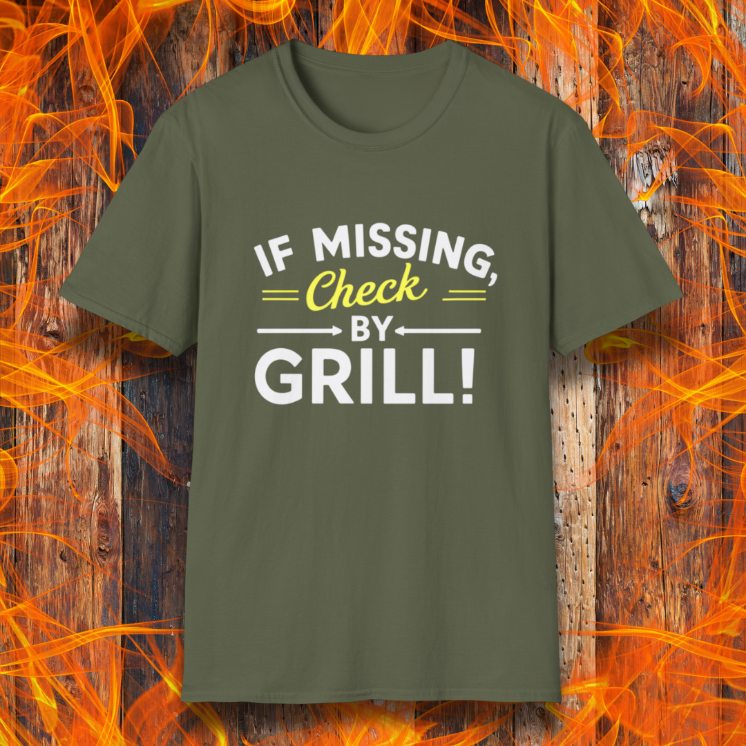 Military Green T-shirt featuring a fun BBQ-themed design. The bold white and yellow text reads 'IF MISSING, Check BY GRILL!' with decorative arrows and highlights, making it the perfect shirt for grill masters who are always found tending to the flames.