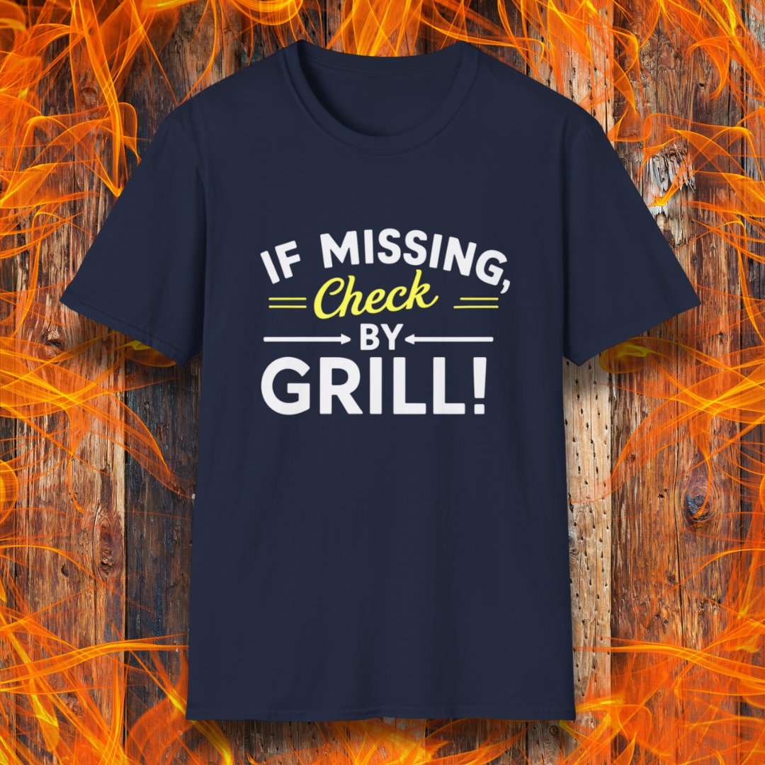 Navy T-shirt featuring a fun BBQ-themed design. The bold white and yellow text reads 'IF MISSING, Check BY GRILL!' with decorative arrows and highlights, making it the perfect shirt for grill masters who are always found tending to the flames.