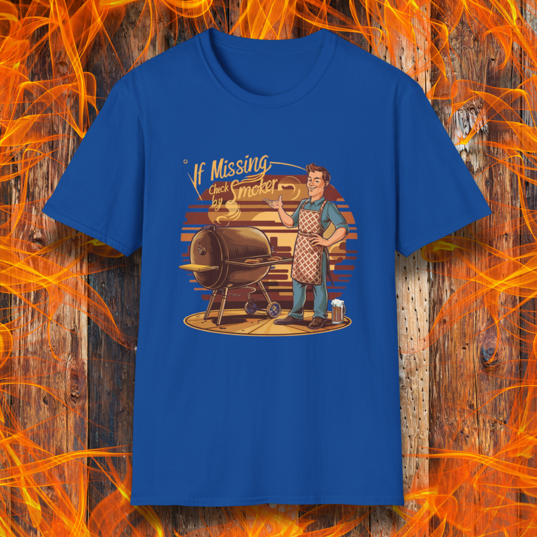 Royal Blue  t-shirt featuring a retro-style illustration of a man grilling next to a smoker, with the phrase 'If Missing, Check by Smoker,' displayed against a fiery wooden background."