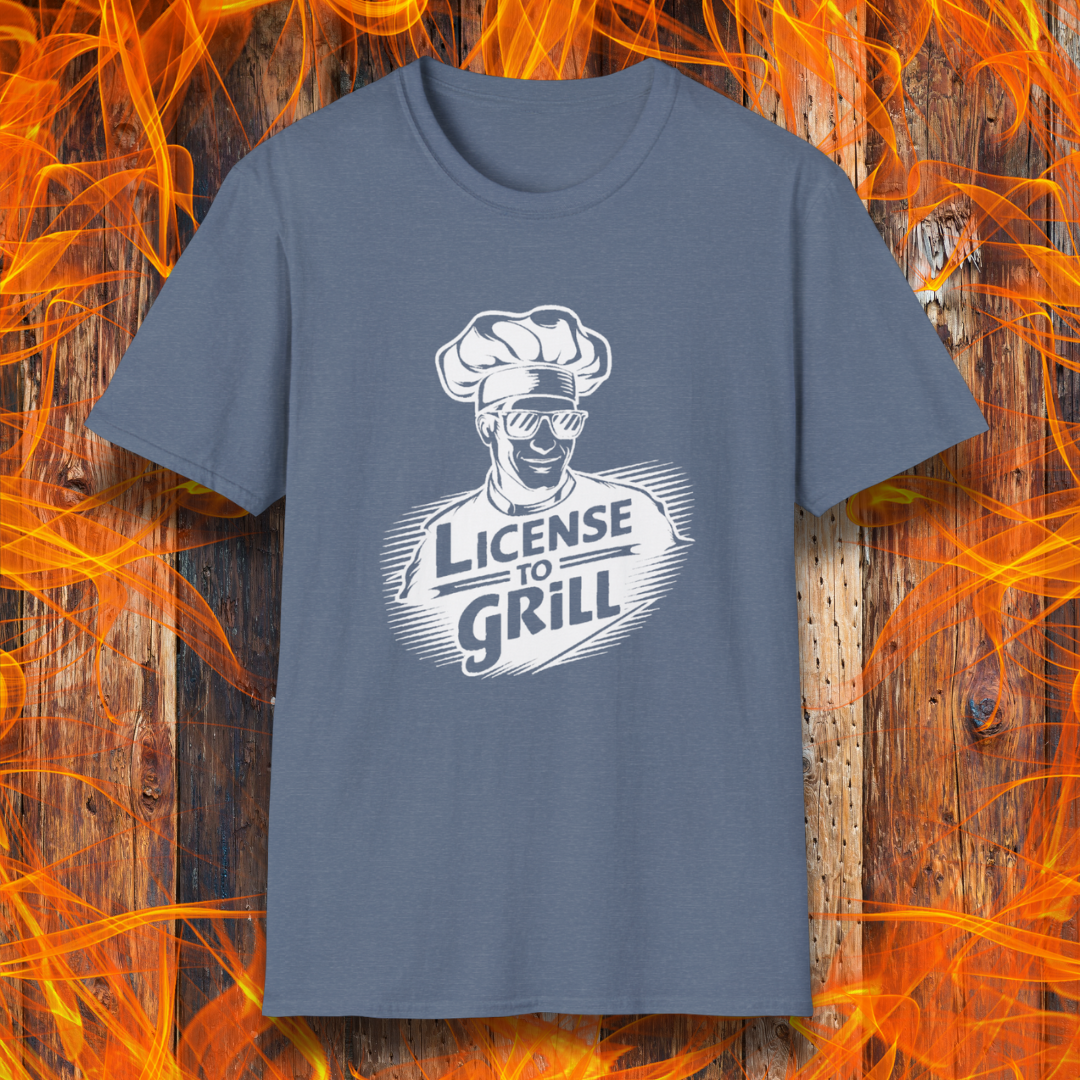 Heather Indigo t-shirt featuring a bold white graphic of a cool chef wearing sunglasses and a toque, with the phrase 'License to Grill' in a dynamic retro-style font.