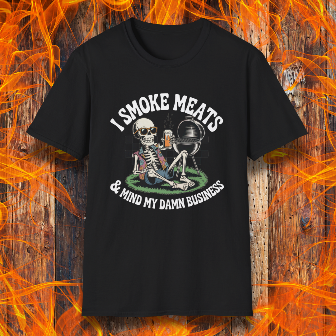 Black t-shirt with skeleton graphic and text 'I Smoke Meats & Mind My Damn Business' on a fiery background