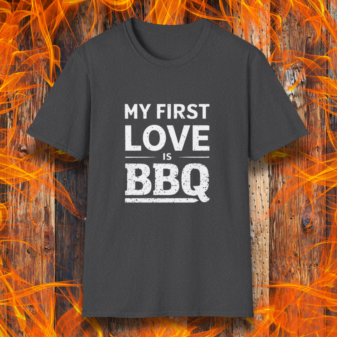 Dark Heather T-shirt with 'My First Love Is BBQ' in bold, distressed white lettering. A must-have for BBQ enthusiasts who wear their passion on their sleeve—literally!