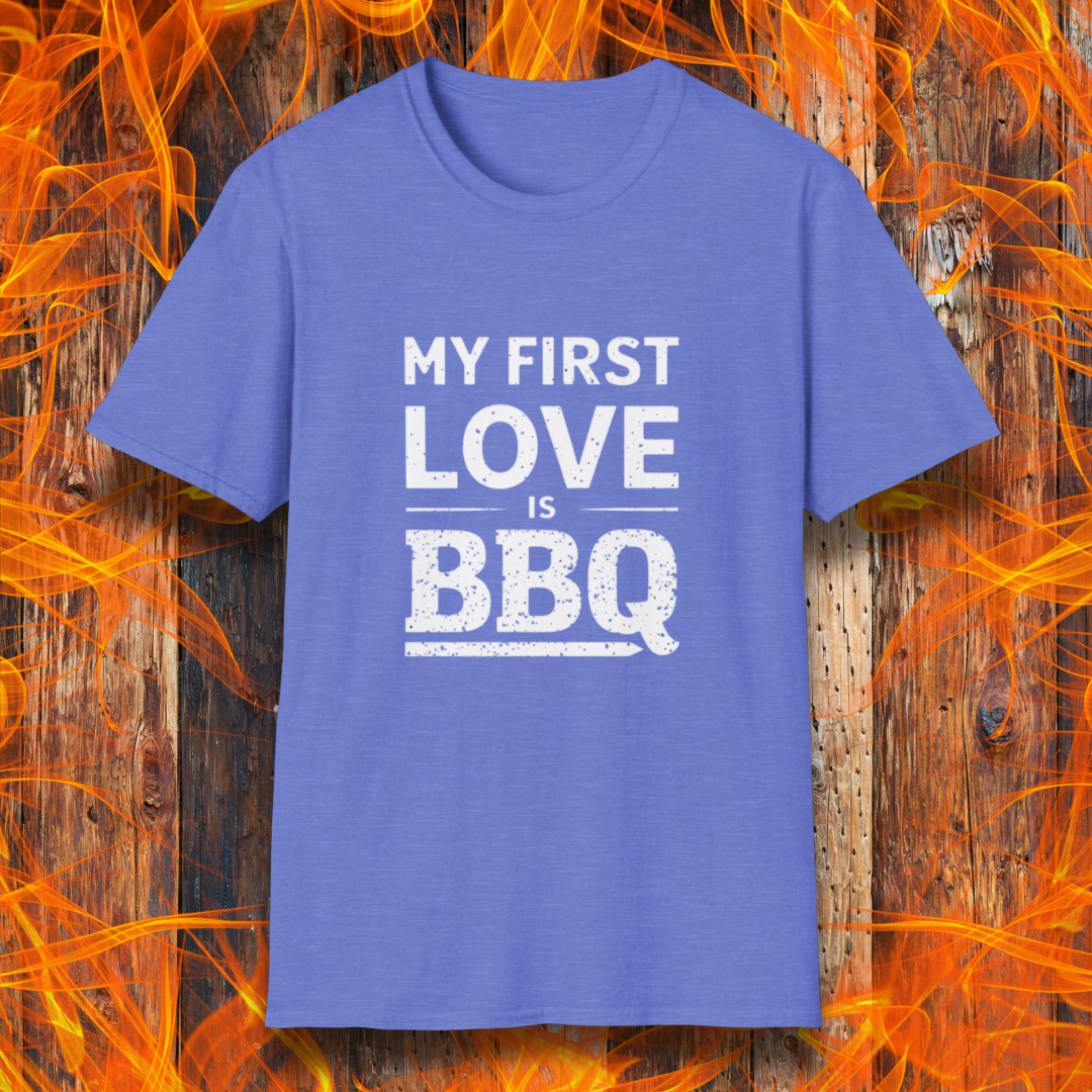 Heather Royal T-shirt with 'My First Love Is BBQ' in bold, distressed white lettering. A must-have for BBQ enthusiasts who wear their passion on their sleeve—literally!