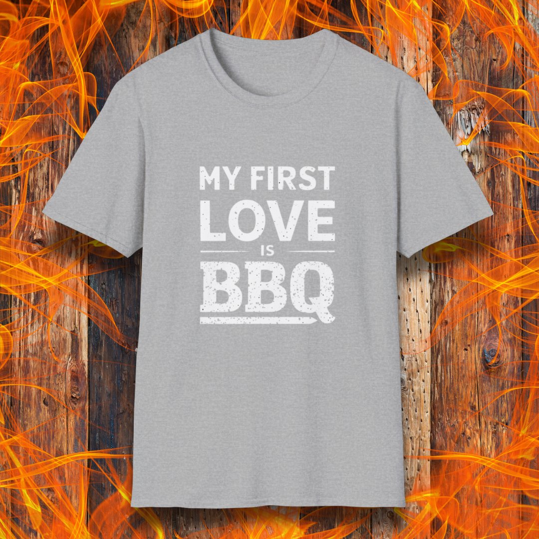 Sport Grey T-shirt with 'My First Love Is BBQ' in bold, distressed white lettering. A must-have for BBQ enthusiasts who wear their passion on their sleeve—literally!