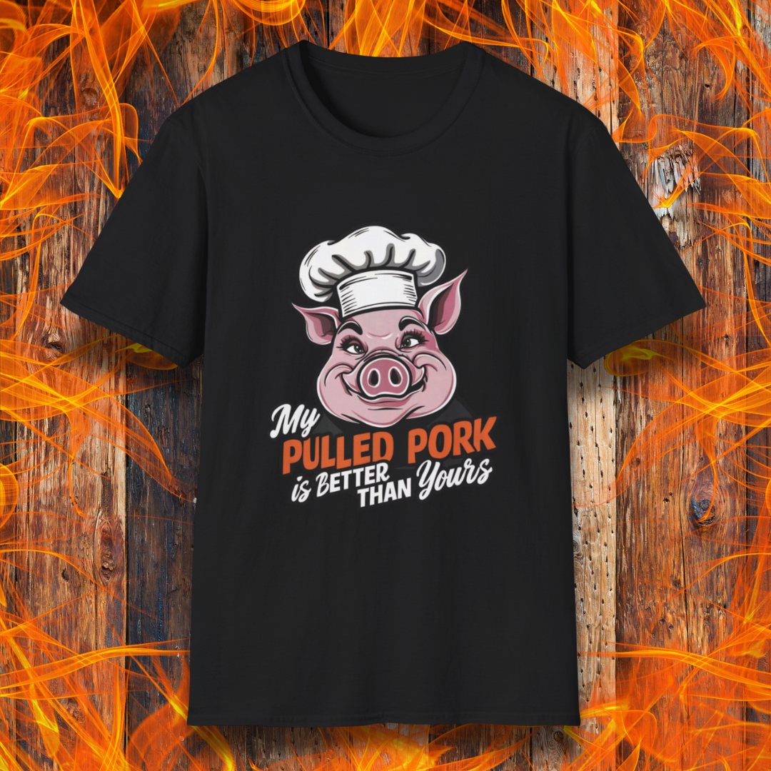 Black T-shirt featuring a fun BBQ-themed design with a pink cartoon pig wearing a chef’s hat. The bold text reads 'My Pulled Pork is Better Than Yours' in a mix of white and red script and block lettering. Perfect for pitmasters who take pride in their slow-cooked pulled pork."