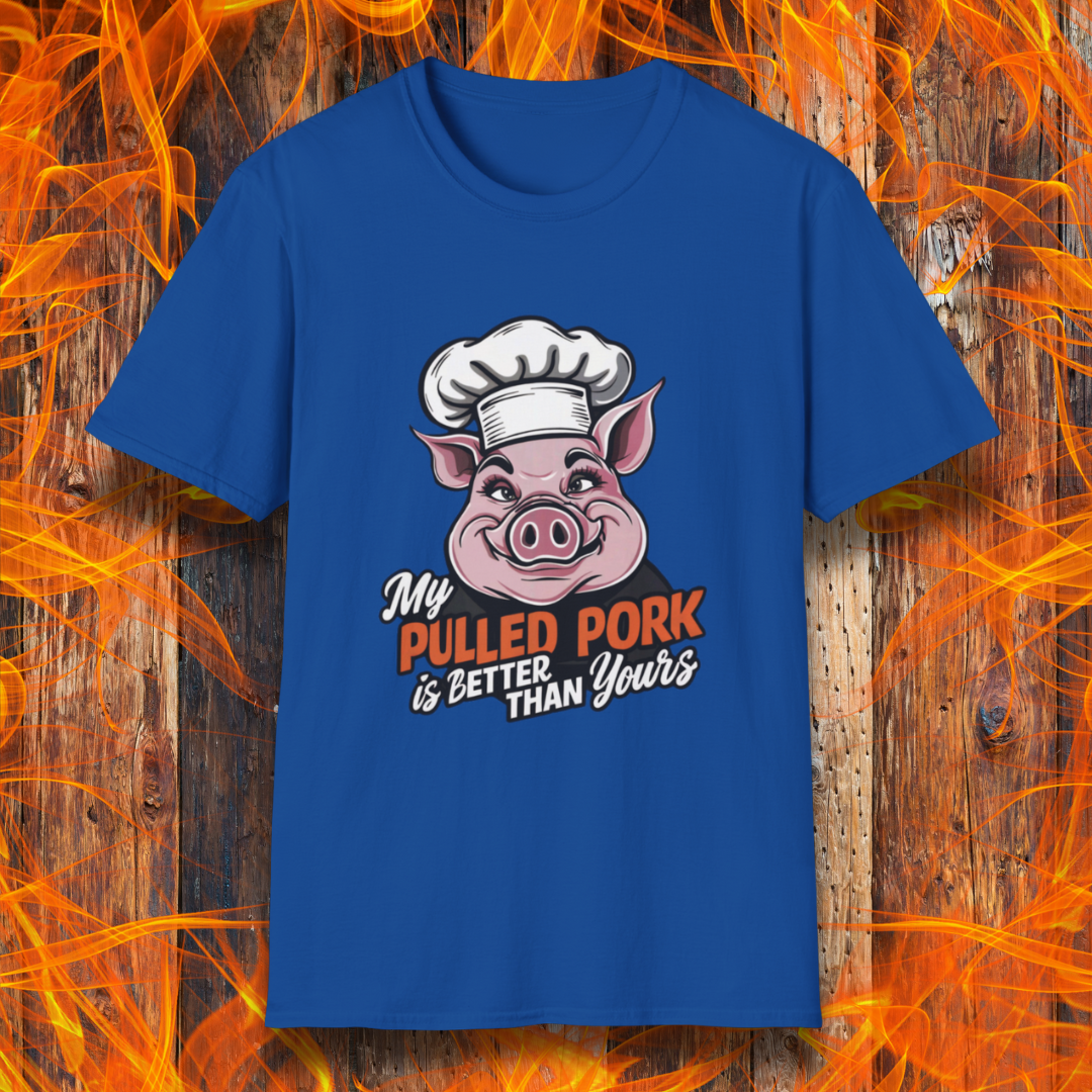 Royal Blue T-shirt featuring a fun BBQ-themed design with a pink cartoon pig wearing a chef’s hat. The bold text reads 'My Pulled Pork is Better Than Yours' in a mix of white and red script and block lettering. Perfect for pitmasters who take pride in their slow-cooked pulled pork."