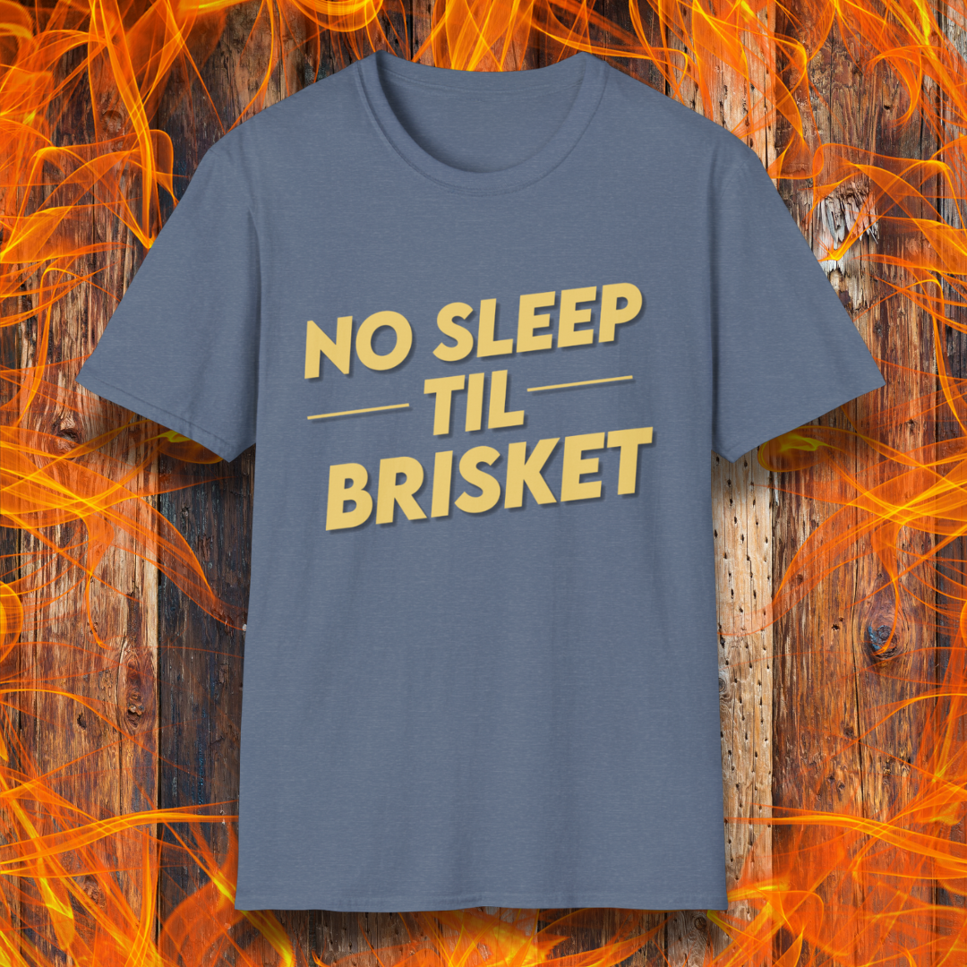 Heather Indigo T-shirt featuring bold, block-style yellow text reading "NO SLEEP TIL BRISKET," with horizontal lines framing "TIL" for emphasis. The design is simple yet impactful, perfect for BBQ enthusiasts who understand the dedication required for the perfect brisket.