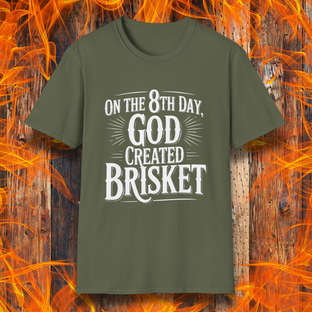 Military Green t-shirt with bold white lettering that declares “On the 8th Day, God Created Brisket.” A divine pick for pitmasters who treat smoked meat like gospel.