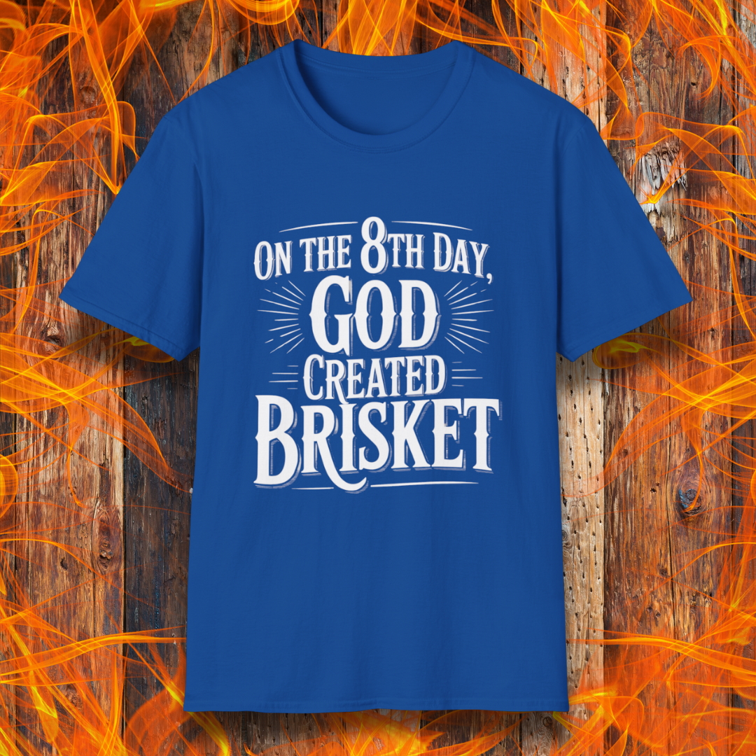 Royal blue t-shirt with bold white lettering that declares “On the 8th Day, God Created Brisket.” A divine pick for pitmasters who treat smoked meat like gospel.