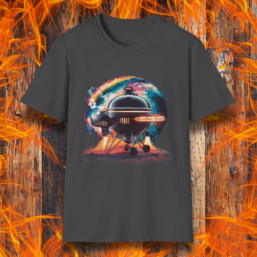 Dark Heather T-shirt featuring a futuristic BBQ kettle grill designed like a rocket ship, with glowing thrusters, steam, and a cosmic background. A perfect design for BBQ lovers with a passion for sci-fi and grilling.