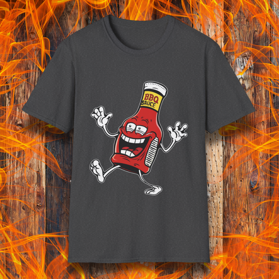 Dark Heather T-shirt with a cartoon BBQ sauce bottle, grinning and dancing with "BBQ SAUCE" on its label. Fun, fiery design for BBQ lovers.