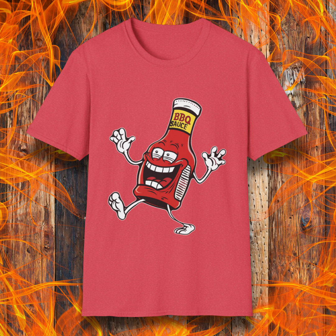 Heather Red T-shirt with a cartoon BBQ sauce bottle, grinning and dancing with "BBQ SAUCE" on its label. Fun, fiery design for BBQ lovers.