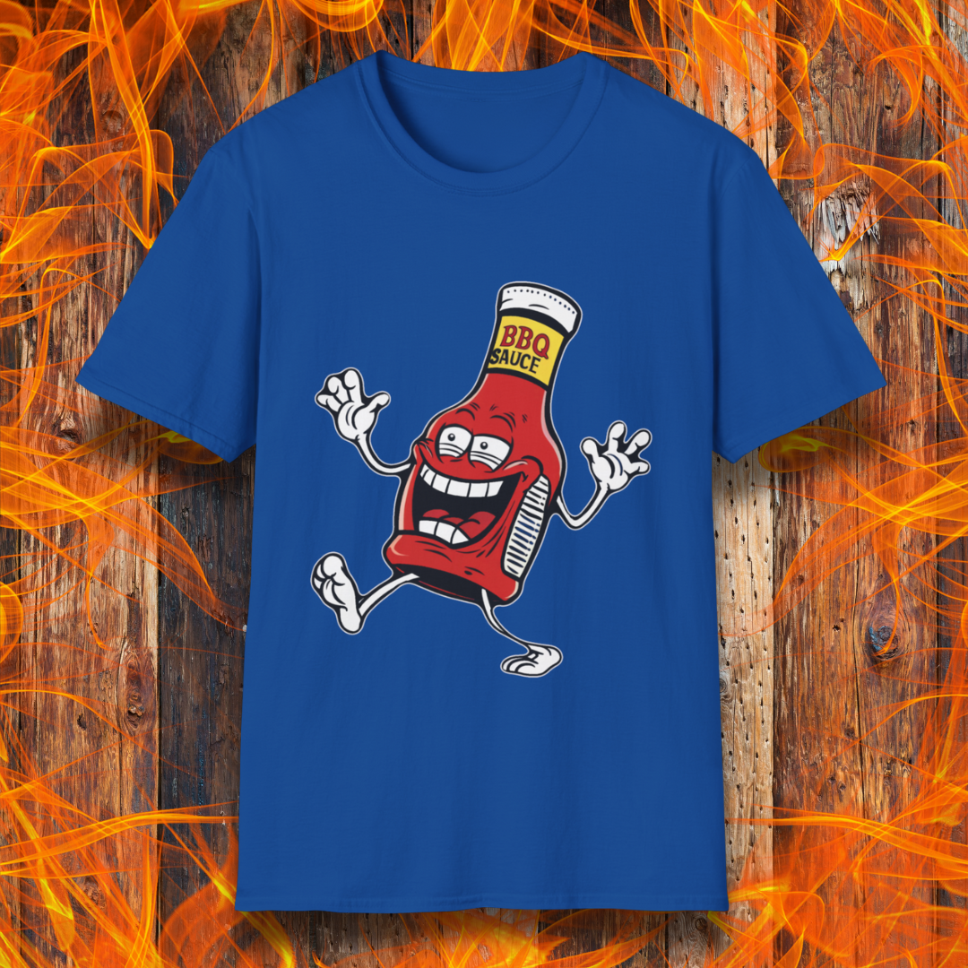 Royal Blue T-shirt with a cartoon BBQ sauce bottle, grinning and dancing with "BBQ SAUCE" on its label. Fun, fiery design for BBQ lovers.