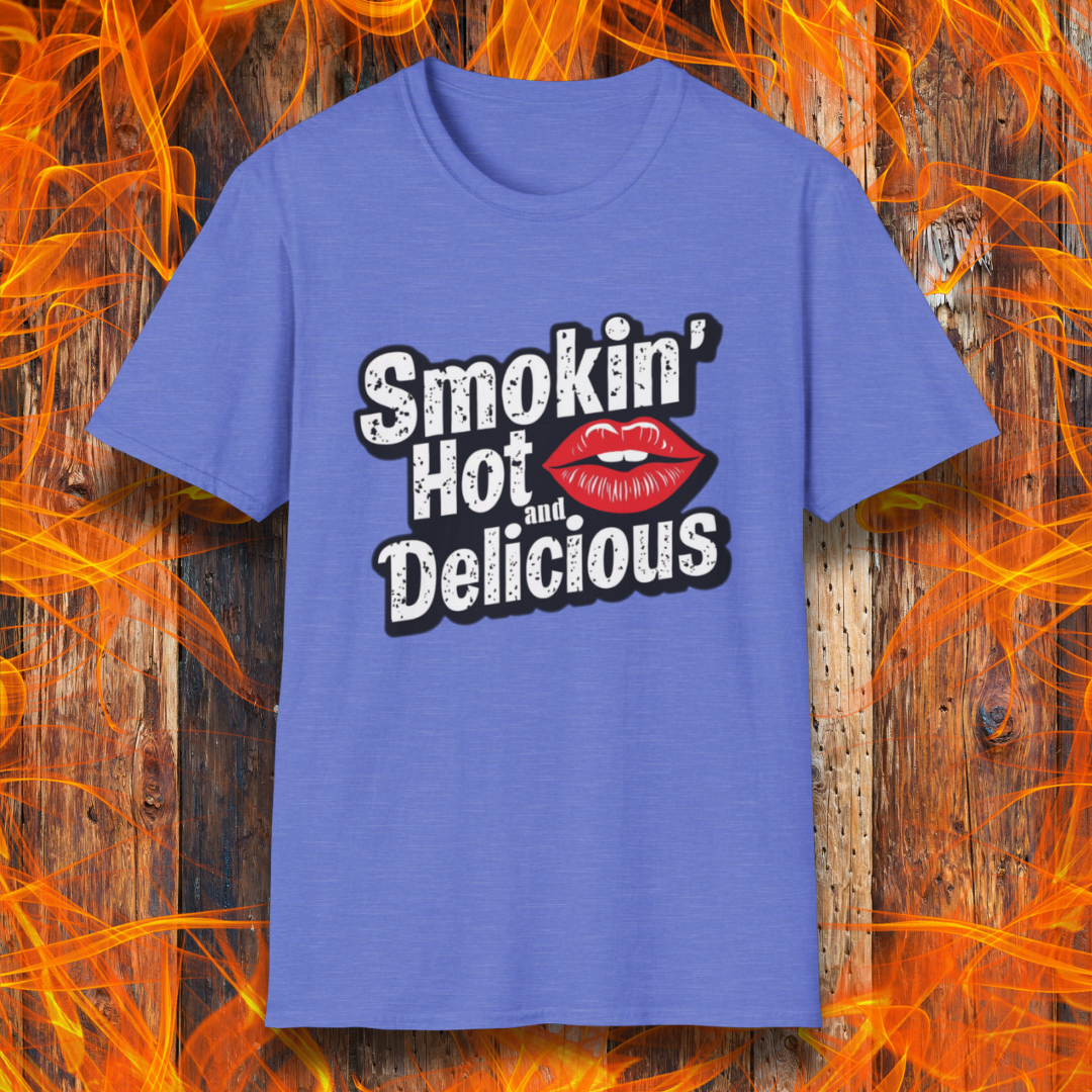 Heather Royal t-shirt featuring bold white text that reads 'Smokin' Hot and Delicious,' with a red lips graphic replacing the 'o' in 'Hot' for a fun, flirty BBQ-inspired design