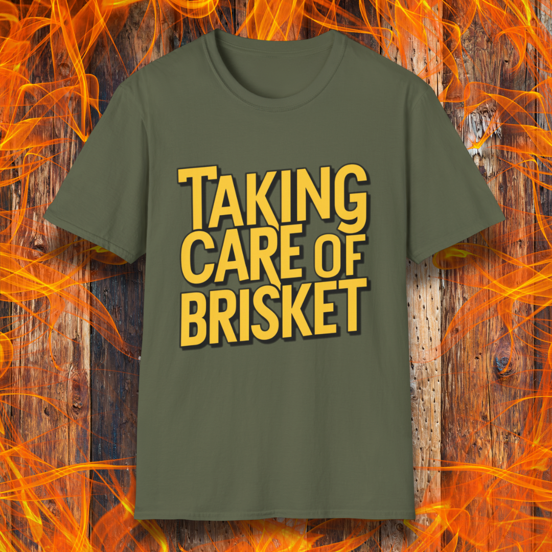 Military Green T-shirt with bold yellow text reading 'Taking Care of Brisket,' a fun BBQ-themed design inspired by classic rock and grilling culture.
