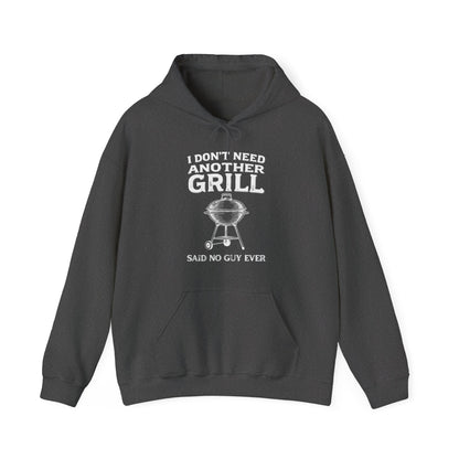 Dark gray hoodie with white text "I don't need another grill said no guy ever" and graphic on a white background