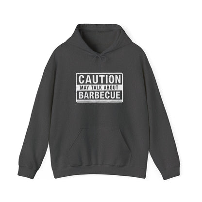 Dark gray hoodie with 'Caution: May Talk About Barbecue' text on a white background
