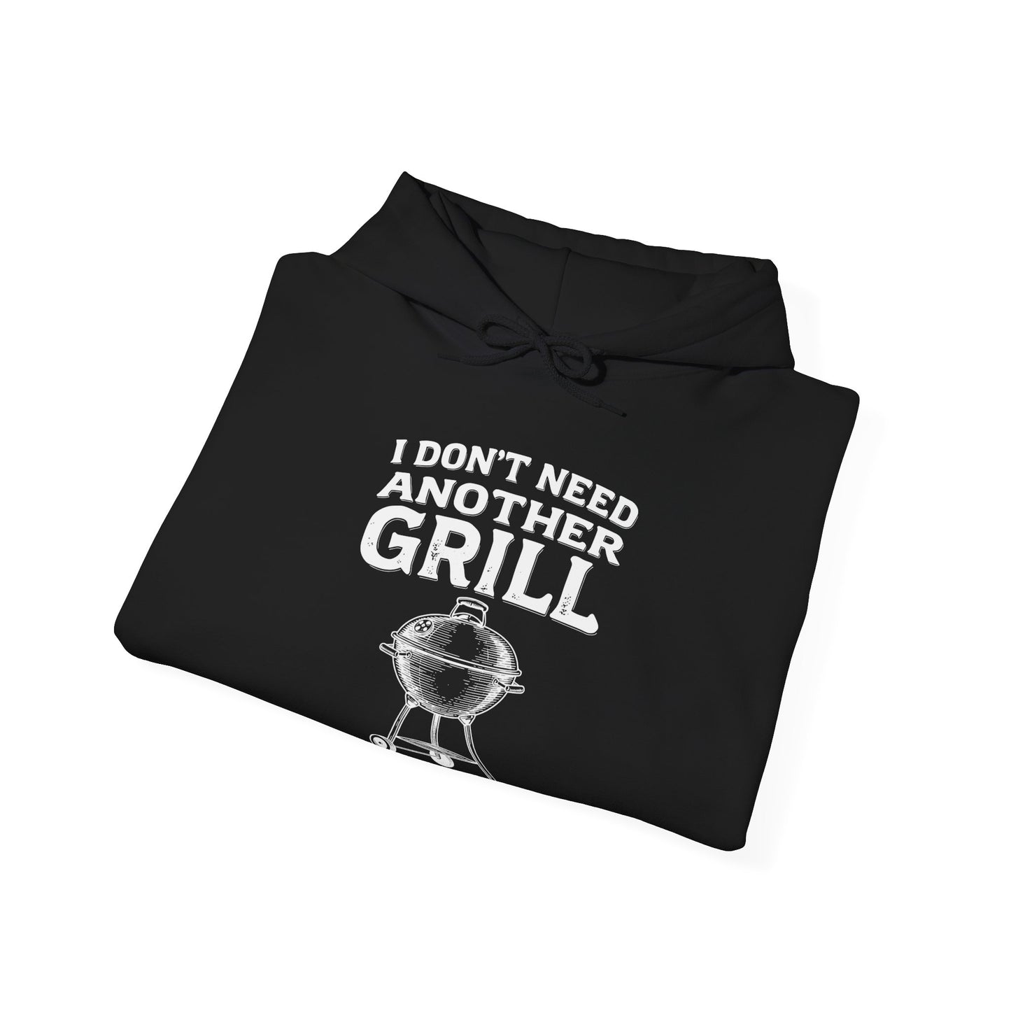 Black hoodie with 'I Don't Need Another Grill' text and graphic on a white background