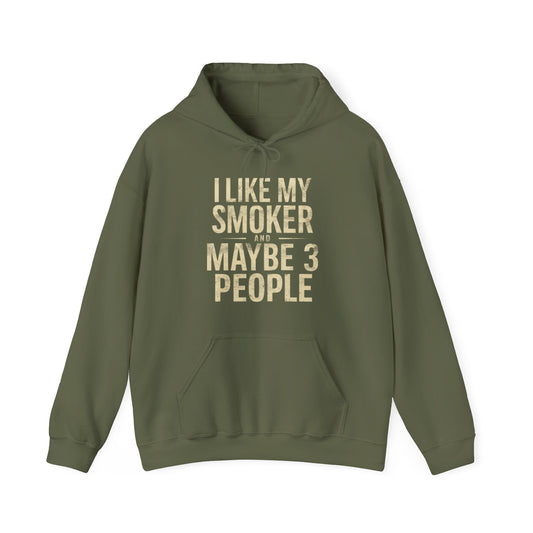 Green hoodie with text 'I LIKE MY SMOKER AND MAYBE 3 PEOPLE' on a white background