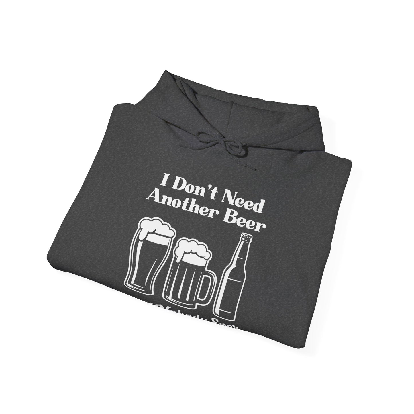 Folded dark gray hoodie with white text "I don't need another beer said nobody ever" and graphics on a white background