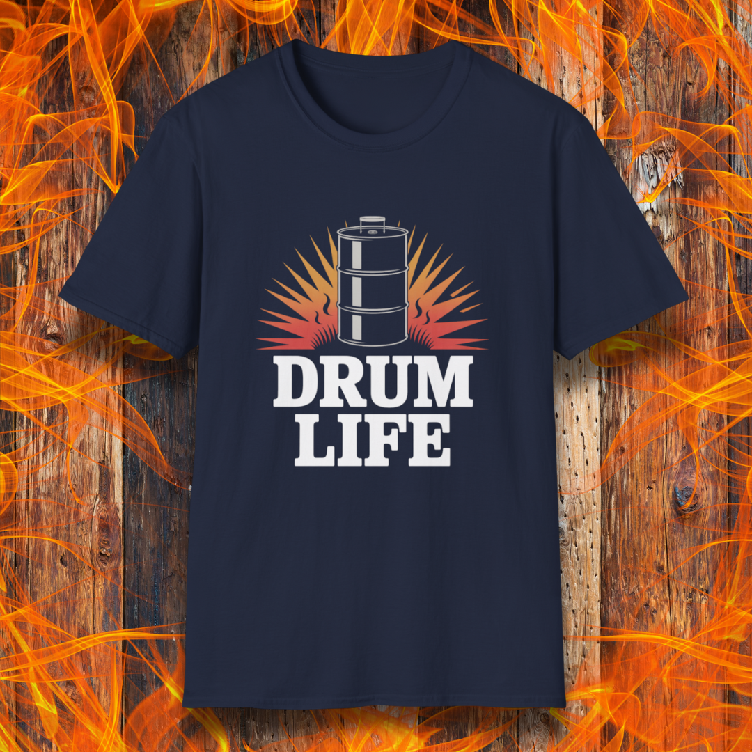 Navy blue t-shirt with 'DRUM LIFE' graphic on a wooden background with flames.
